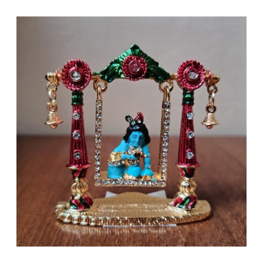 Malý Krišna z pozlaceného kovu